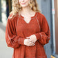The Slouchy Rust Two Tone Knit Notched Raglan Top