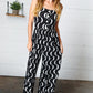 Black Abstract Wave Button Jumpsuit